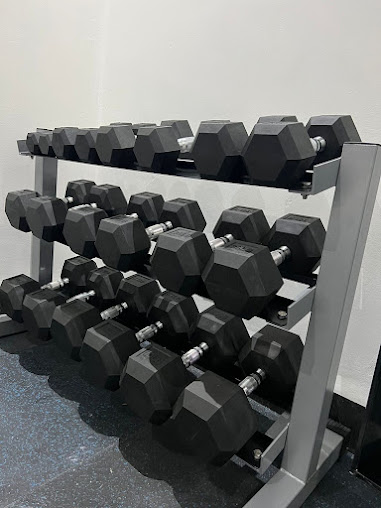 Rack con mancuernas